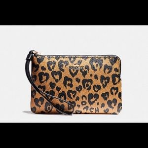 Coach wild hearts cheetah wristlet